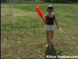 Cute Teen Kitty Playing Baseball Outdoors